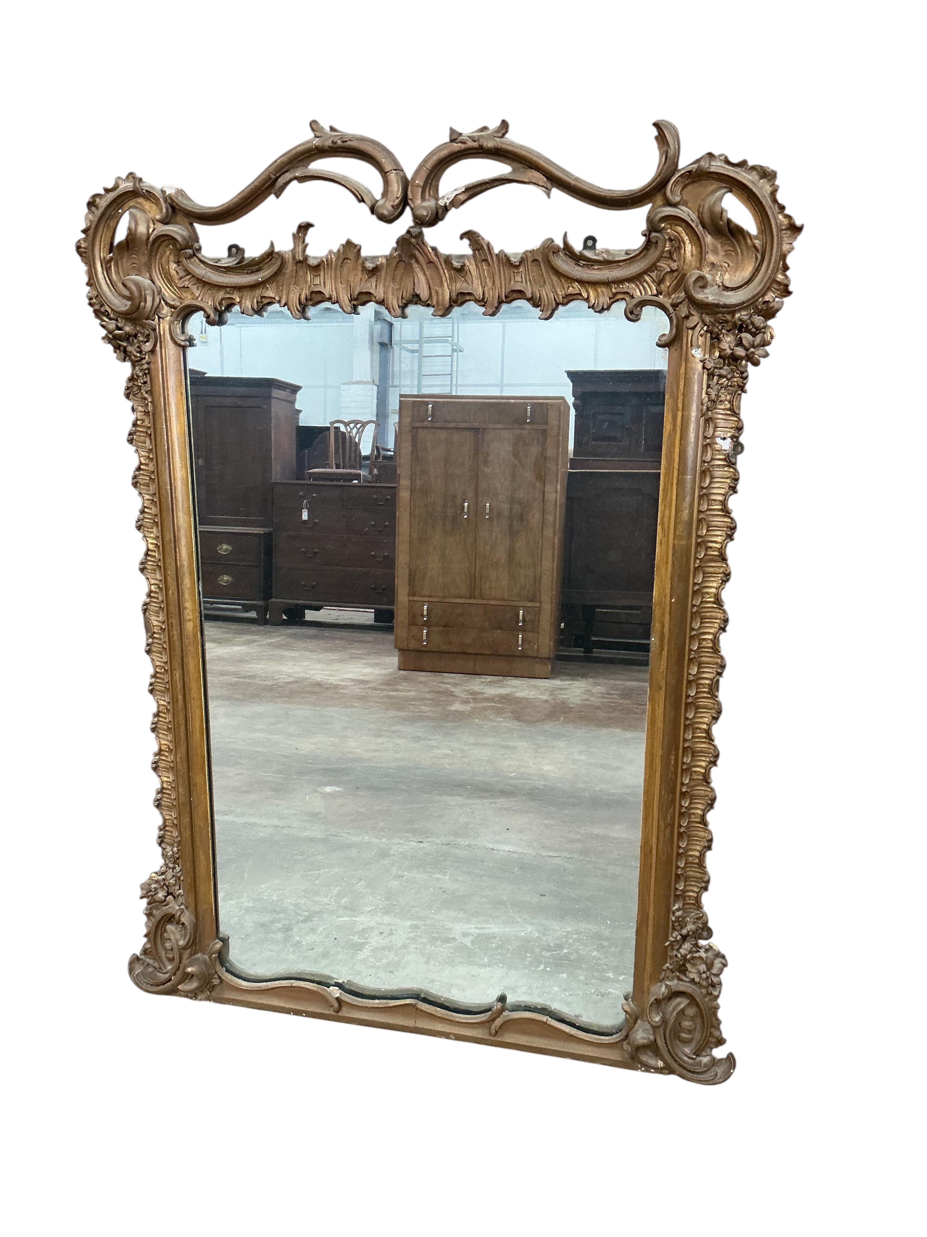 A Victorian giltwood and composition overmantel mirror, width 92cm, height 126cm